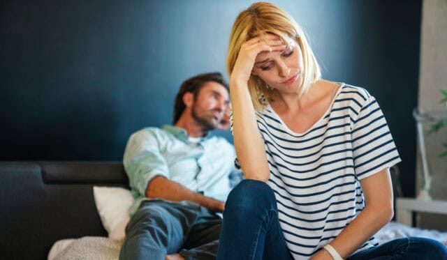 Young sad couple, family having financial problems, depression, crisis. People divorce, stress concept.
