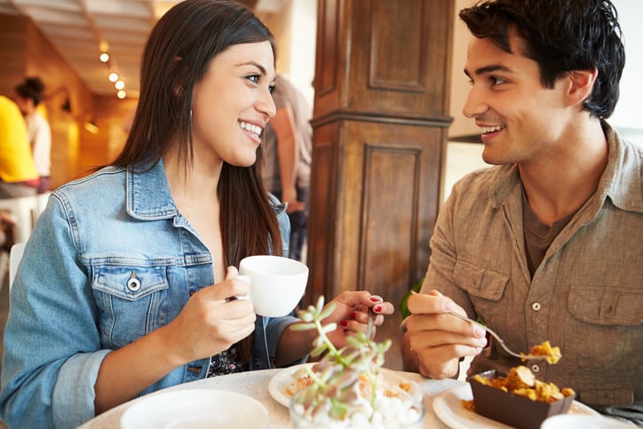 couple flirting in coffee shop