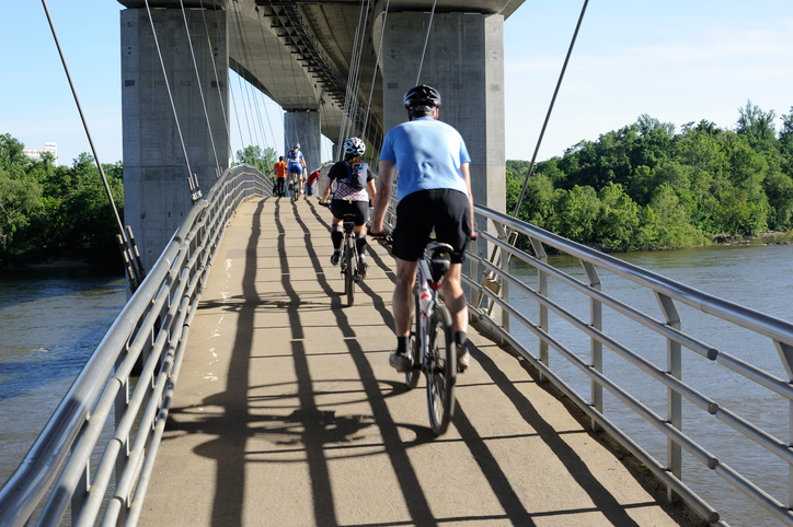 Biking on Bridge over the James River in Richmond, VA.