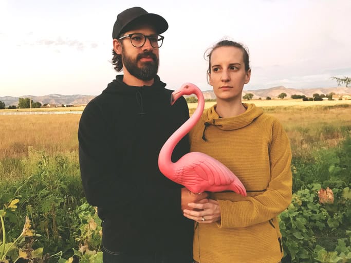In Western ColoradoYoung Beautiful Millennial couple male and female husband and wife posing with props in rural setting (photos professionally retouched and filters applied as needed - (Shot with iPhone 7 Plus 12mp 4032 × 3024 photos professionally retouched - Lightroom / Photoshop)