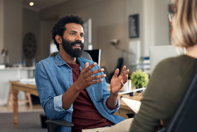 man talking to a woman