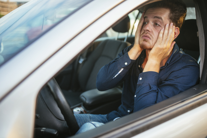 Frustrated man in traffic.