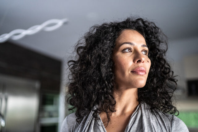 smiling woman looking off to side