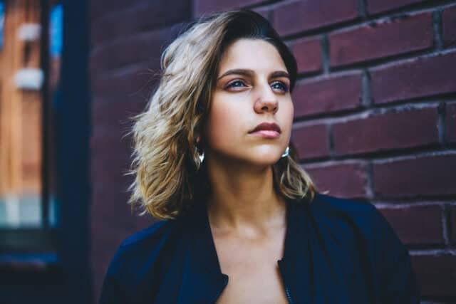 serious woman looking off into distance