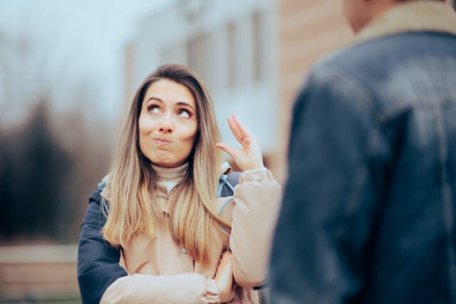 Bored annoyed girlfriend feeling distrustful and patronizing eye roll