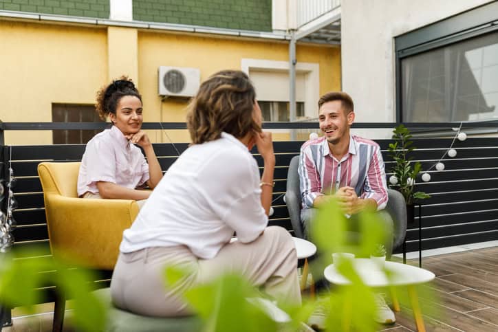 friends having a conversation outdoors