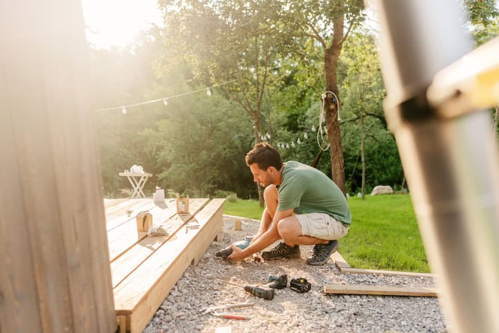 man DIY building deck