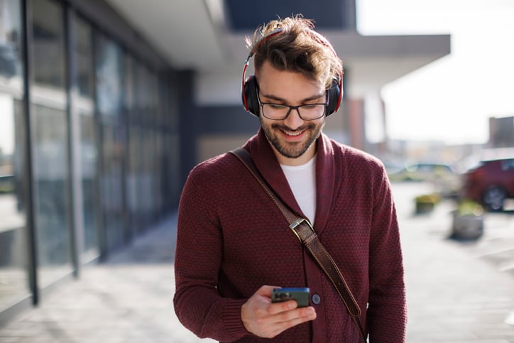Man wearing headphones listening to music