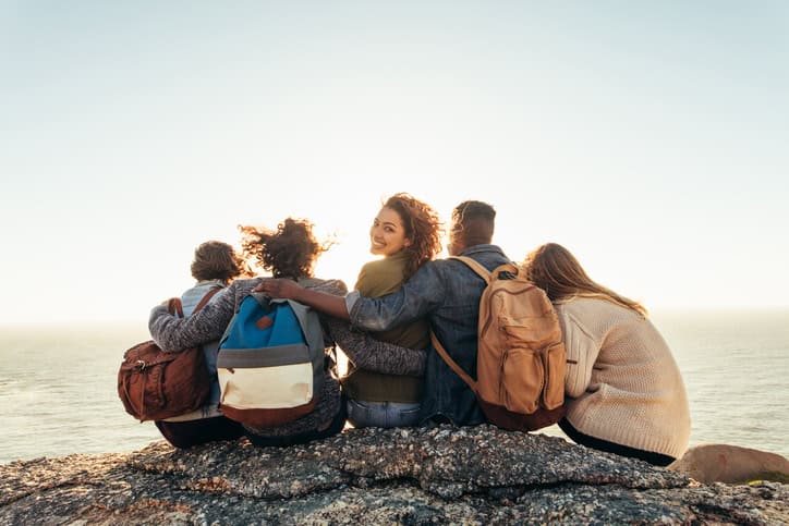 Woman with friends enjoying a day outdoors.