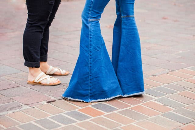 Bell bottom jeans on a fashionable woman.