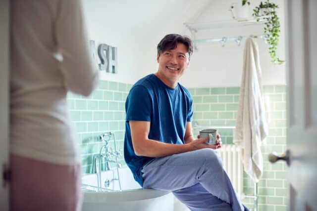 Man and woman in the bathroom.