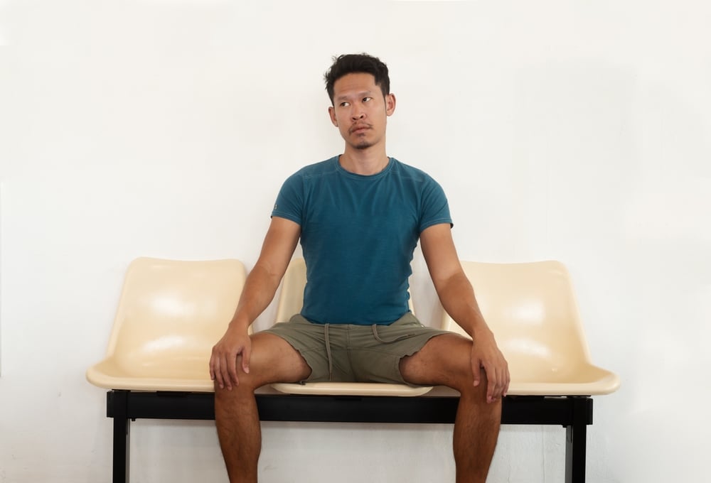 Man meditating alone.