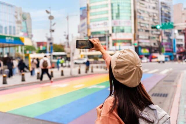 Woman taking a selfie while on vacation.
