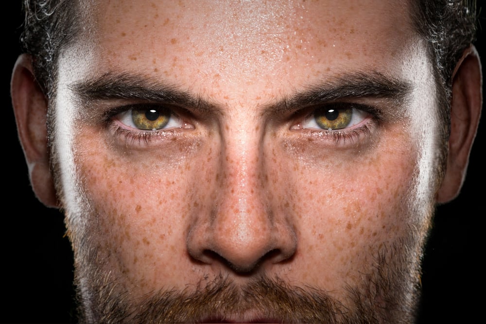 Man intensely awake.