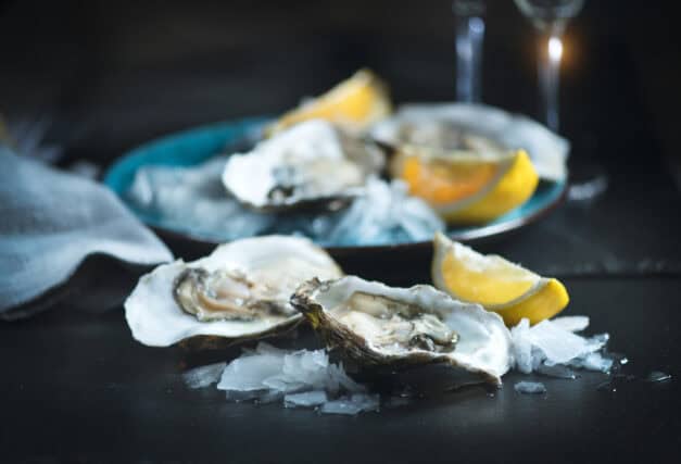 Fresh oysters on a plate.