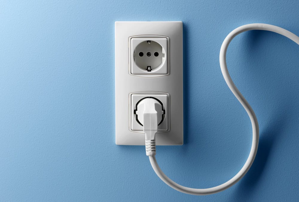 Wall socket with a cord.