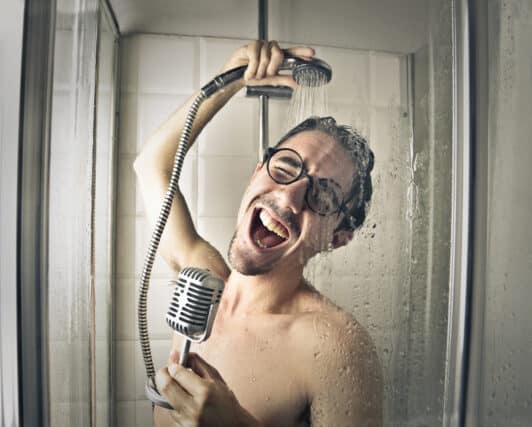Singing in the shower.