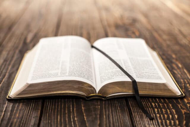 Open book on a table.