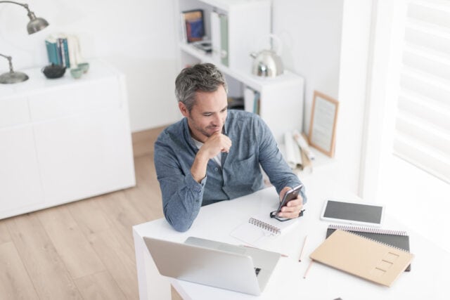 Man working at computer.