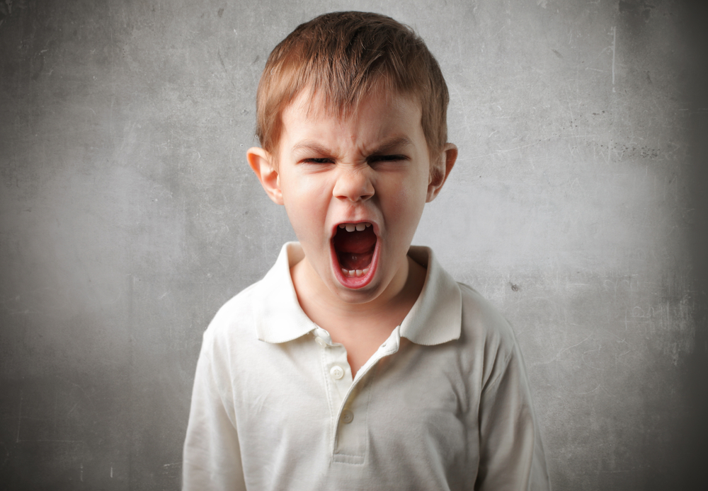 Child with angry expression.