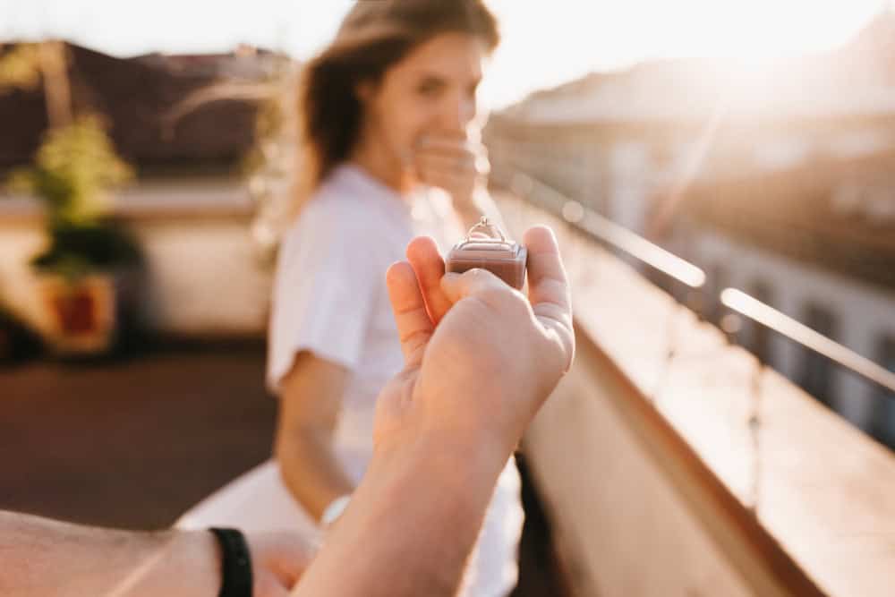 Man proposing to his girlfriend.