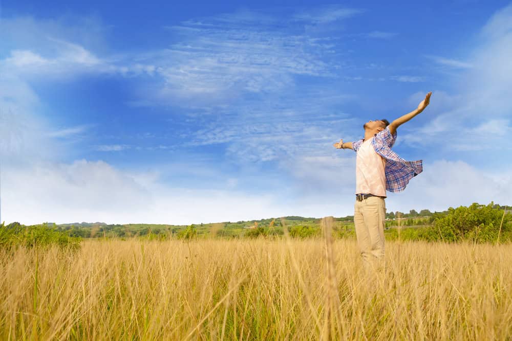 Man outside in a field.