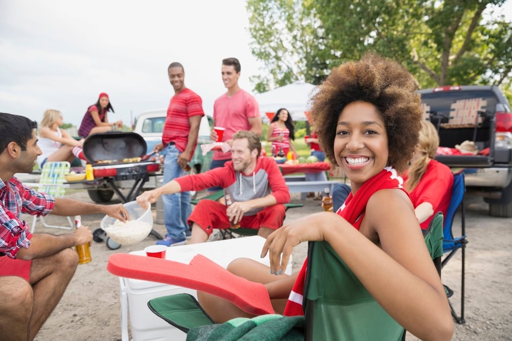 Friends enjoying a tailgate.