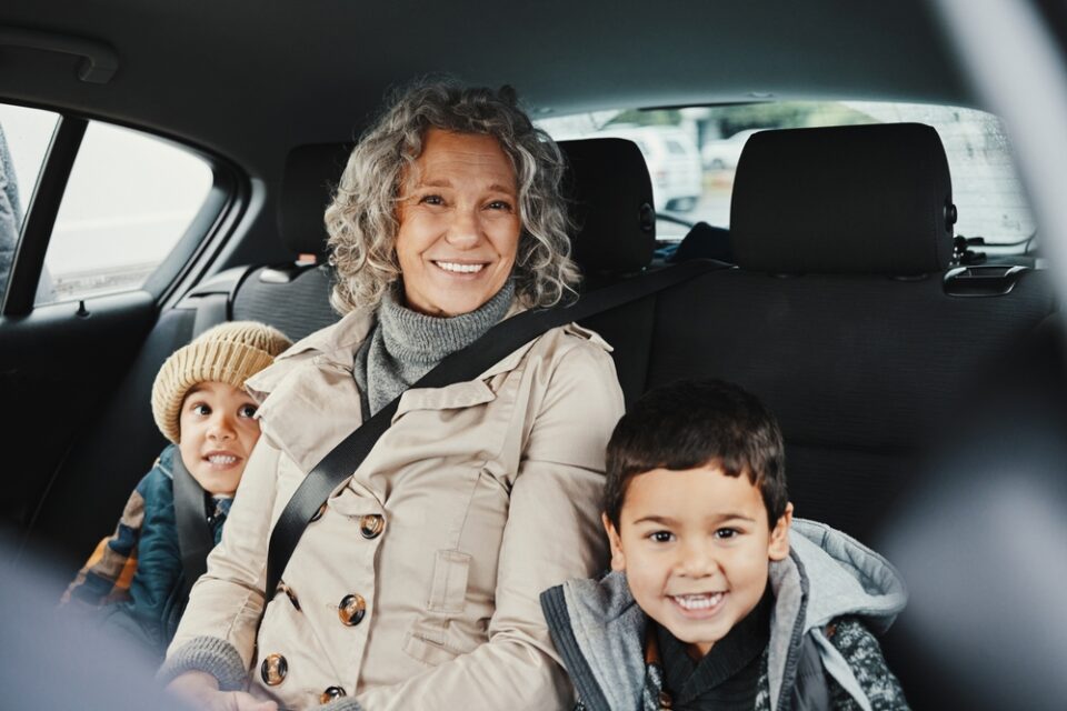 Children and grandparents in the car.