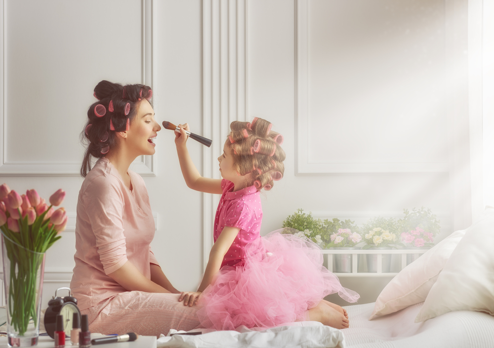 Mother and daughter playing together.