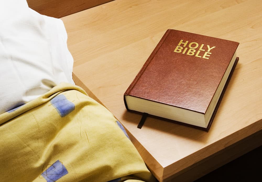 A bible in a hotel room. 