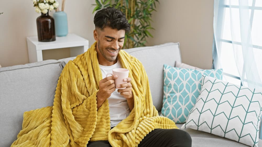 Man drinking coffee from his favorite mug.