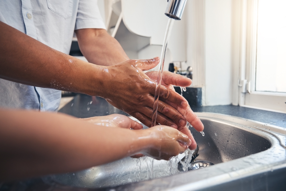Washing hands.