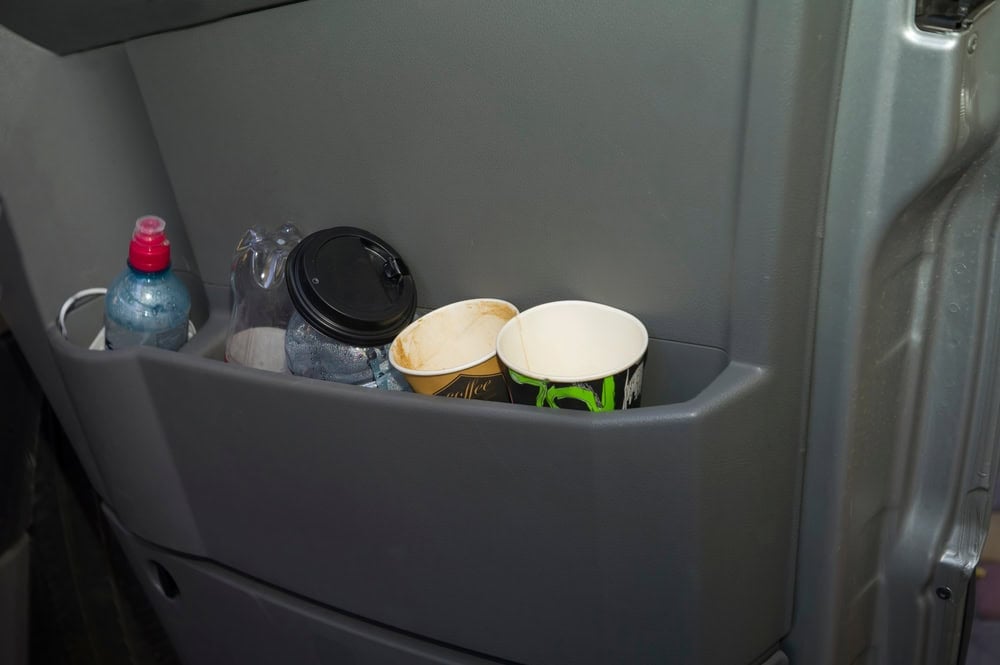 Garbage in the interior of a car.