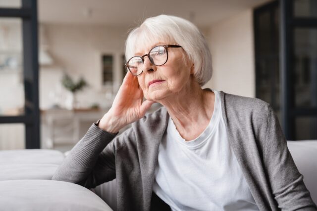 Older woman thinking about things.