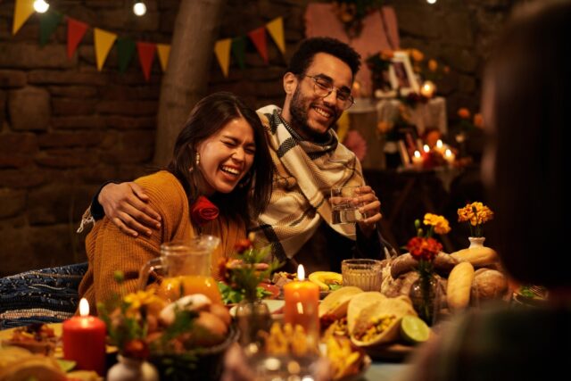 Happy couple at festive gathering