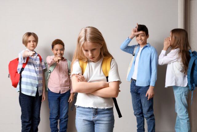 Bullied girl with her classmates.