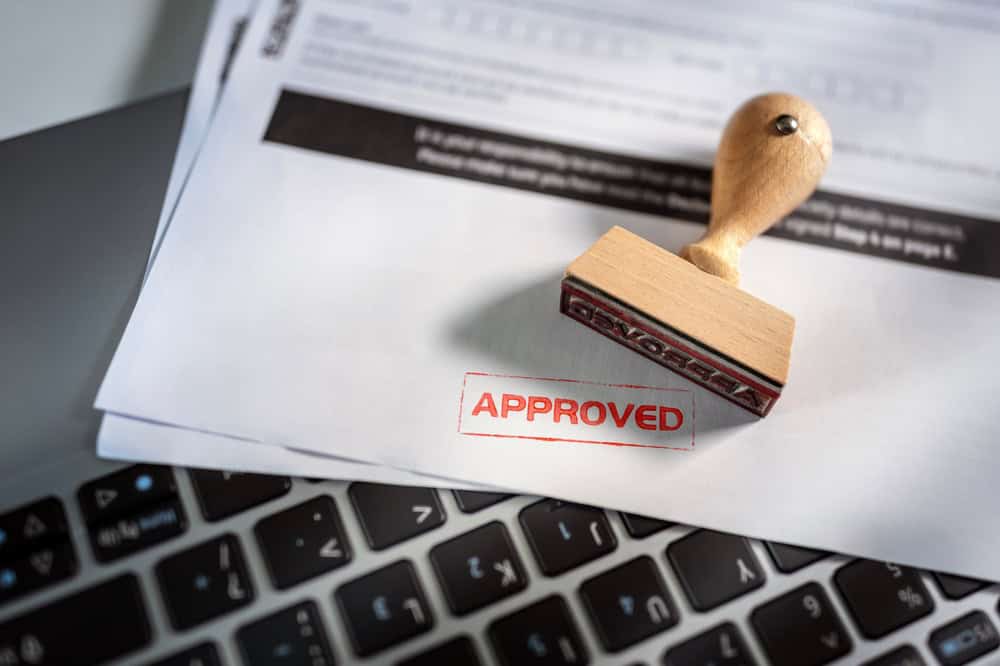Approved stamp on an application.