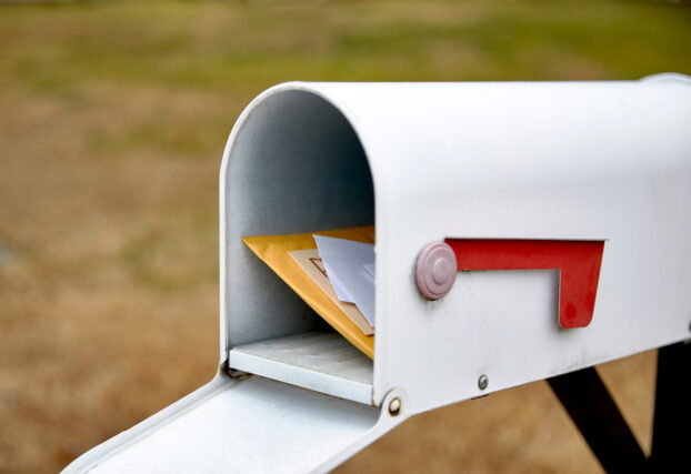 A mailbox full of mail.