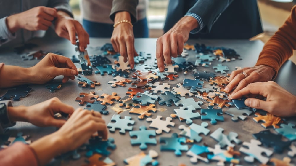 Friends doing a puzzle together.