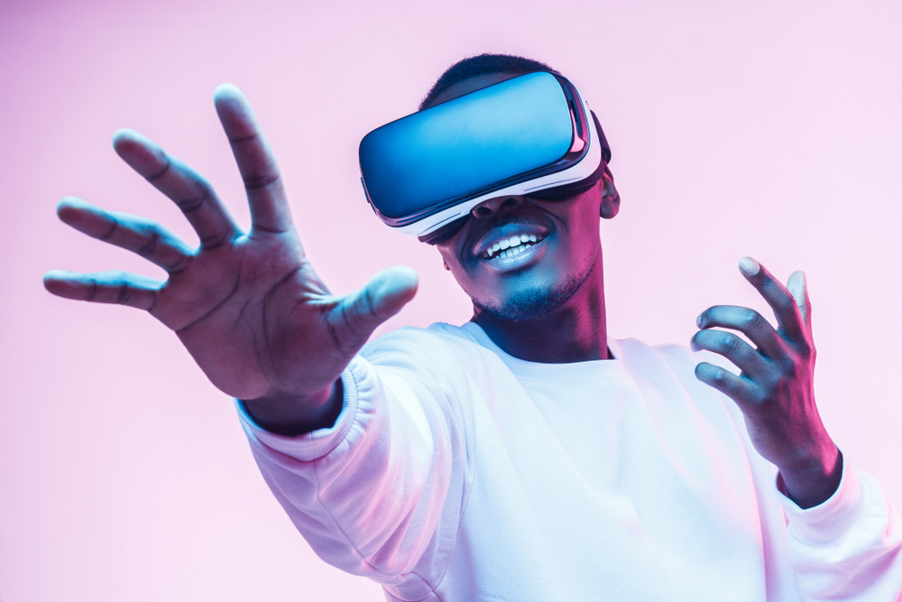 A man wearing VR goggles.