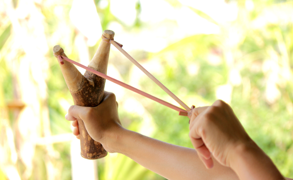 Slingshot with a rubber band.