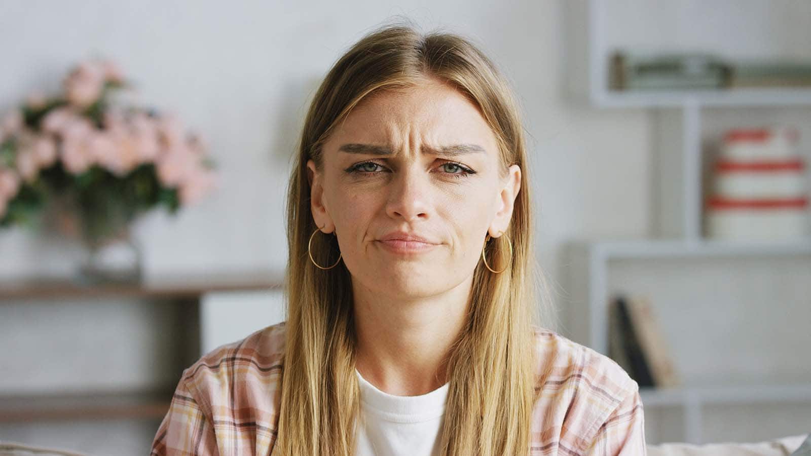 Woman disgusted with someone's behavior