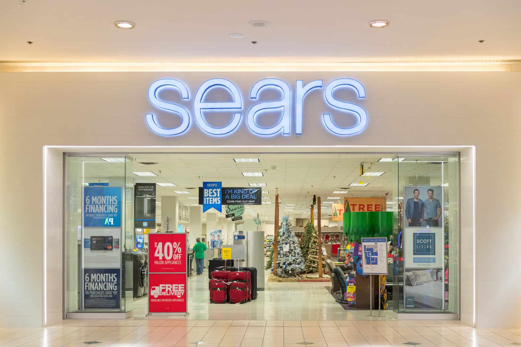 The exterior of a Sears store. 