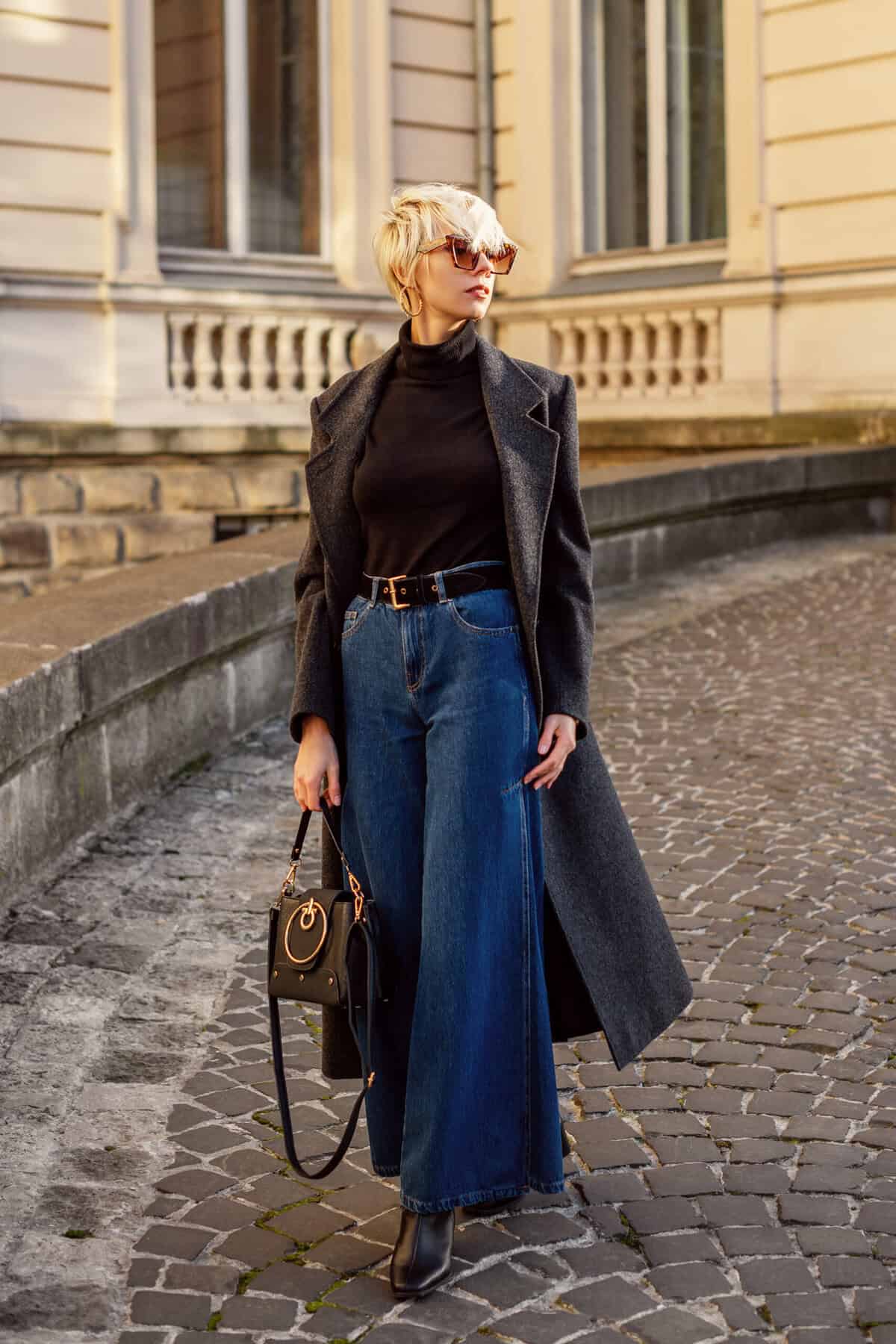 Woman wearing wide leg jeans. 