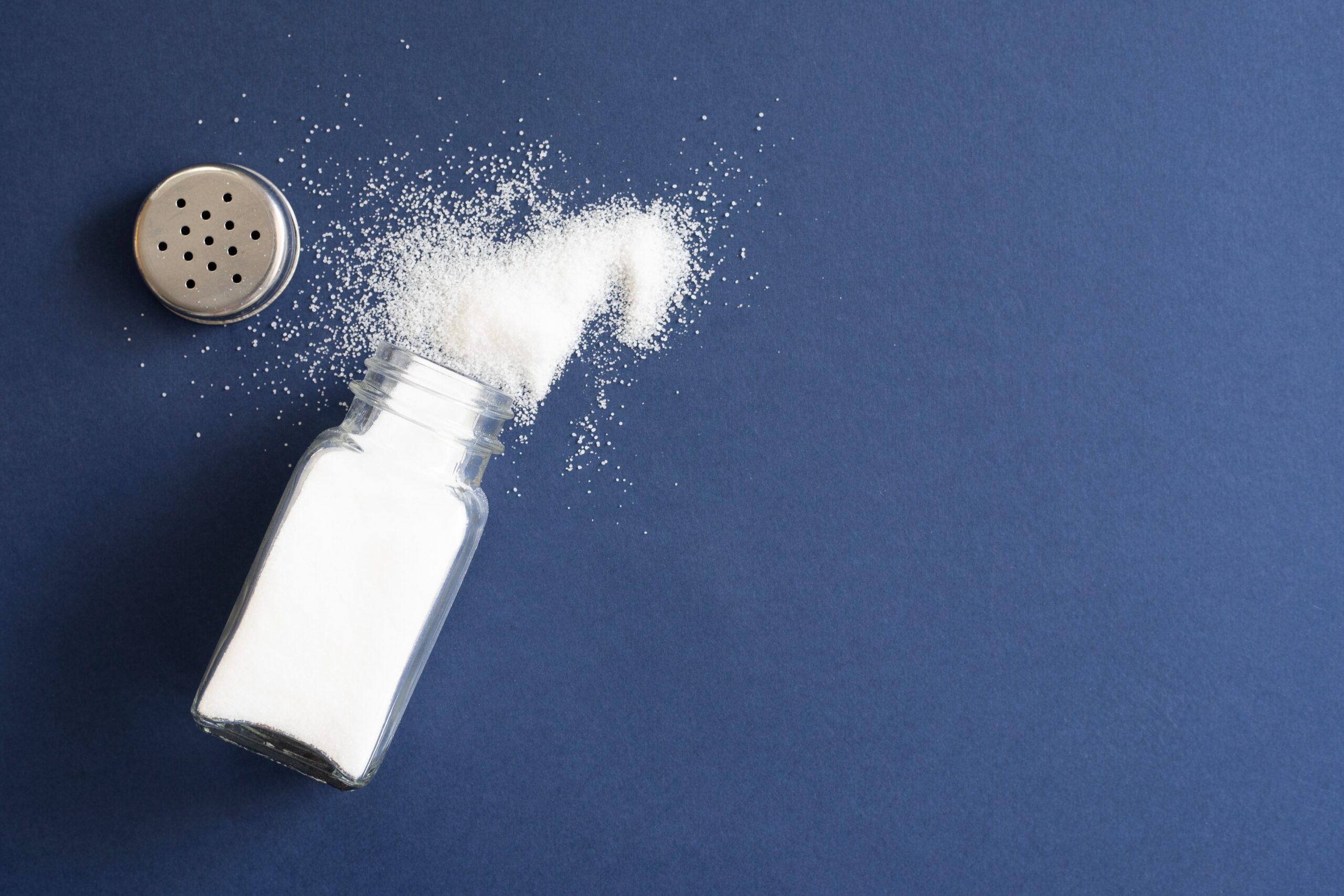 Salt shaker on the table.