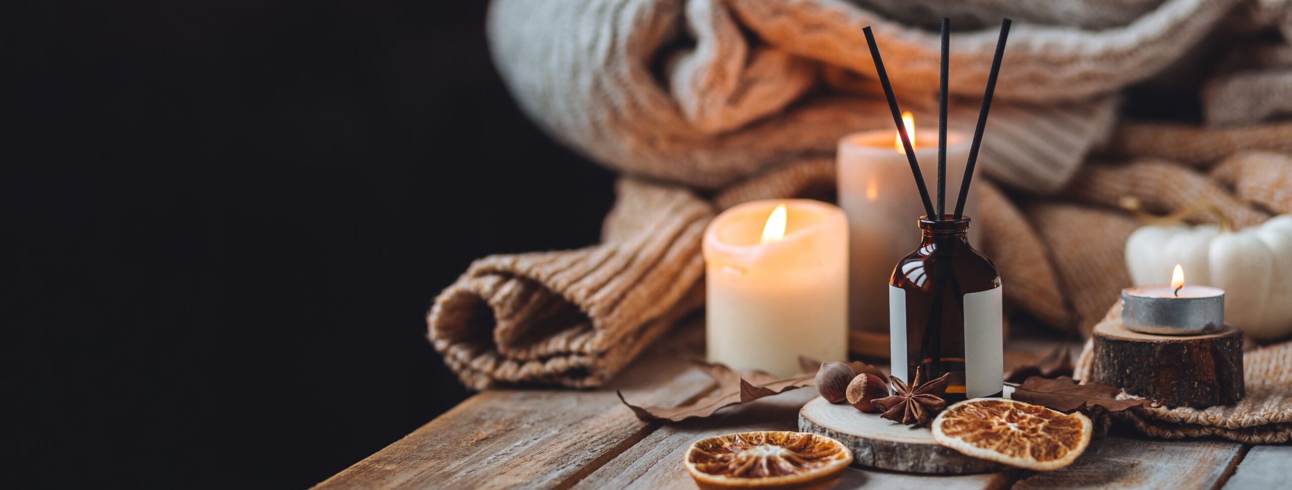Fancy candles lit at home.