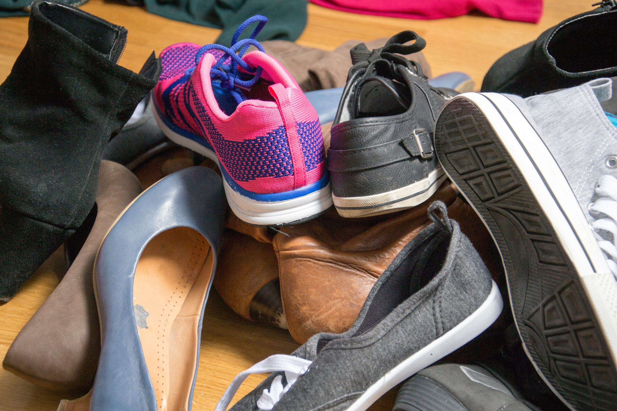 Shoes all over the floor.