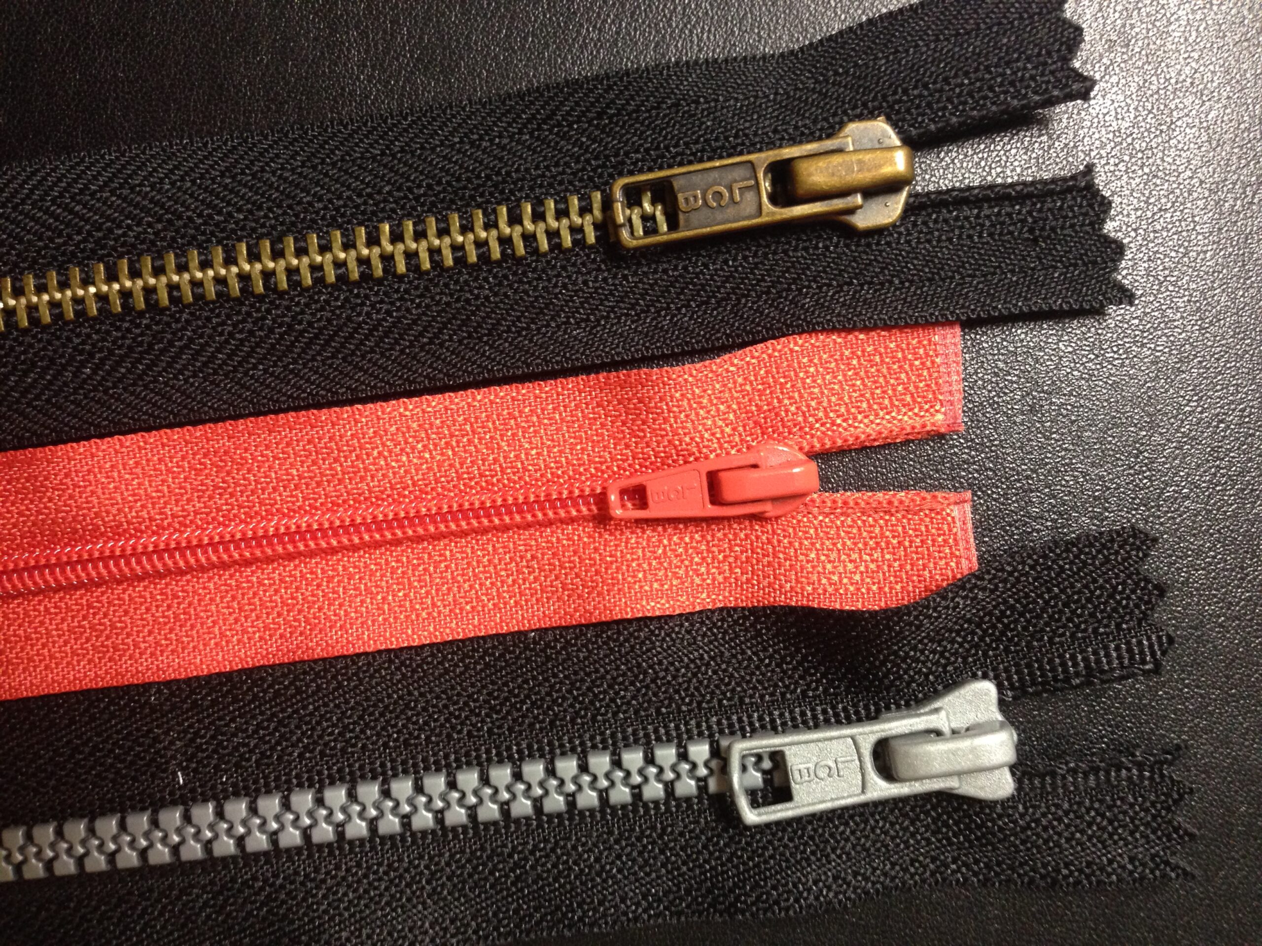 Different kinds of zippers.