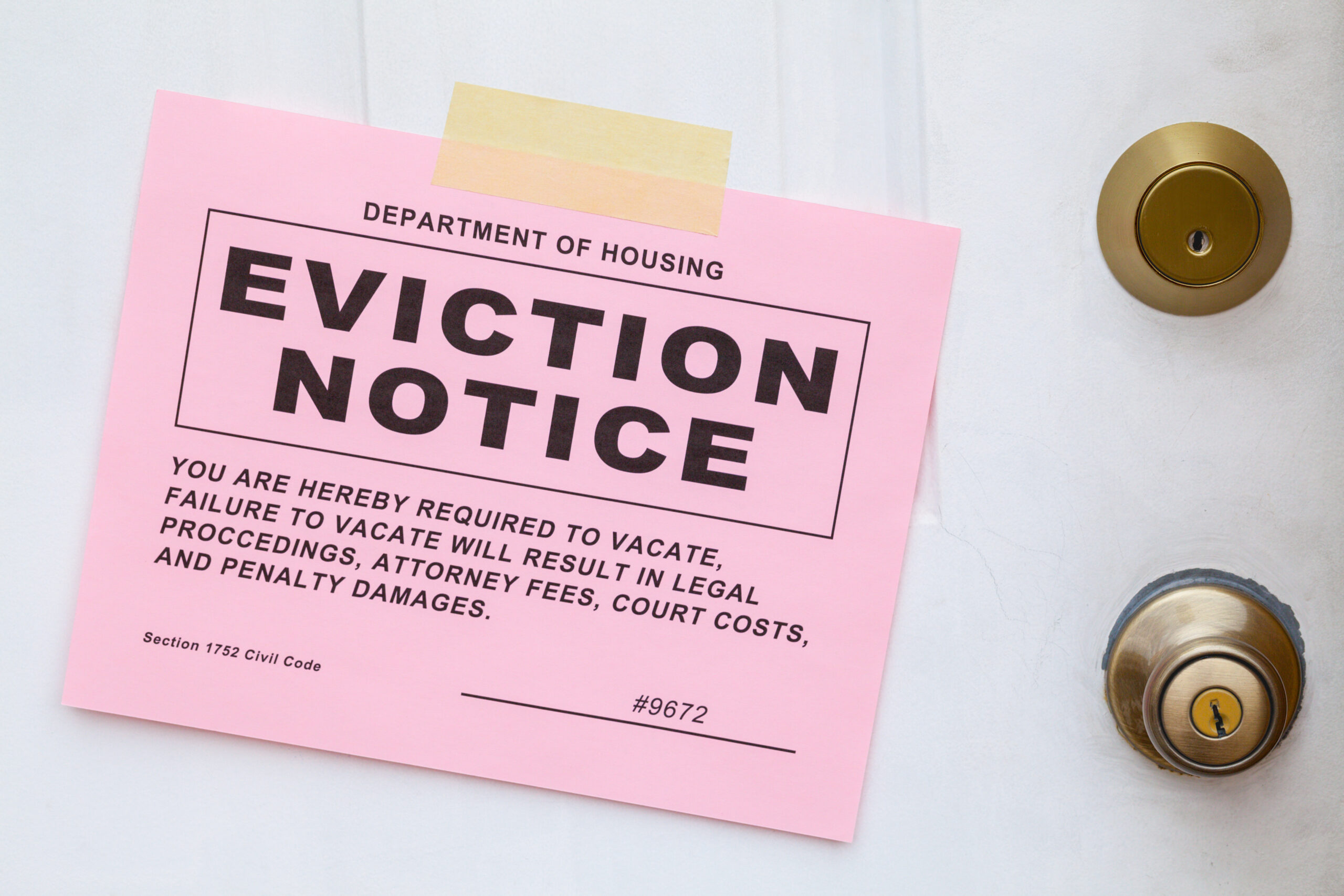 Eviction notice taped to a door.