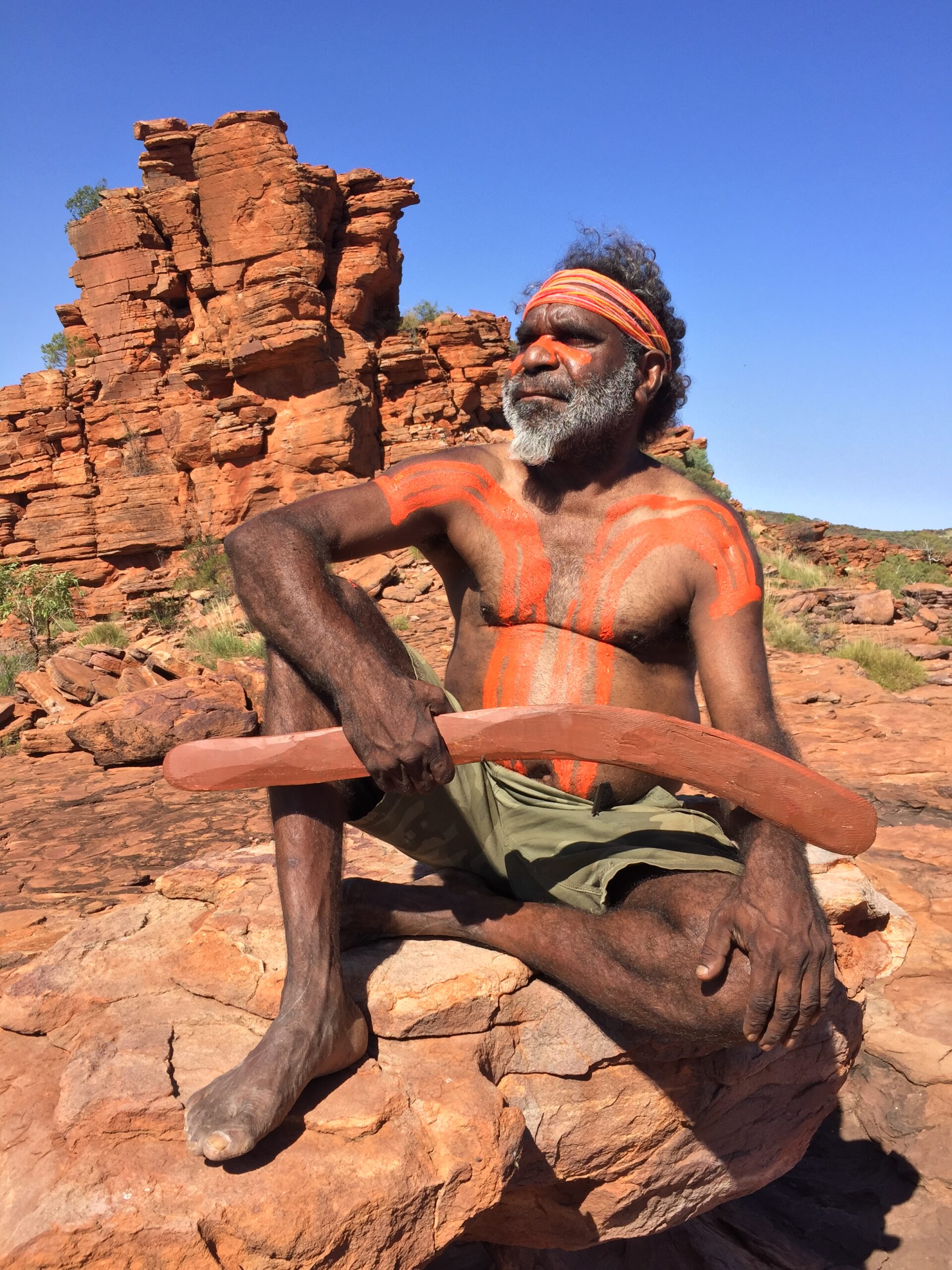 Aboriginal man with boomerang, near Yuendumu, Australia.